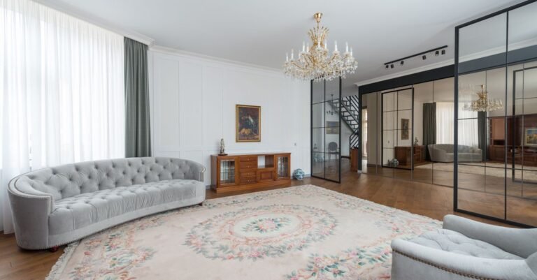 Carpeted living room with an area rug